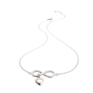 Sterling silver 925°   infinity with a dangling heart anklet . 23cm plus 4cm extension.