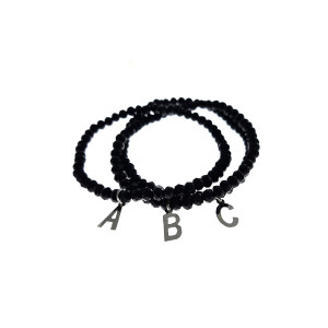 Sterling Silver 925° initial on a black synthetic crystal beaded stretch bracelet.