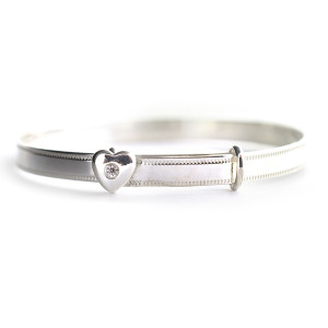 Sterling silver 925° baby bangle with engraved border and 3D c.z. heart. 