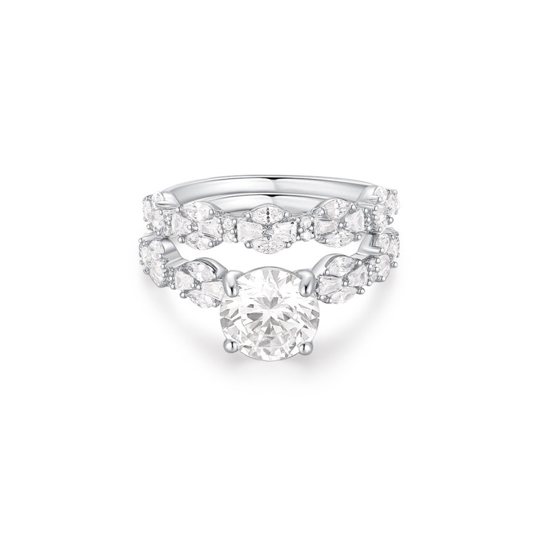 Sterling silver 925 solitaire ring with a main cz stone and fancy stones down the side with matching fancy cz band