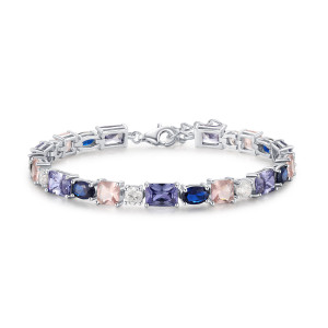 Sterling Silver 925 tanzanite, nano, spinel and clear cz bracelet. Length 16cm plus 3cm extender. Width 4mm.